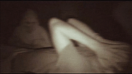 GIF from Entry 45. Alex is on the ground while Masky walks up to him, rock in hand.